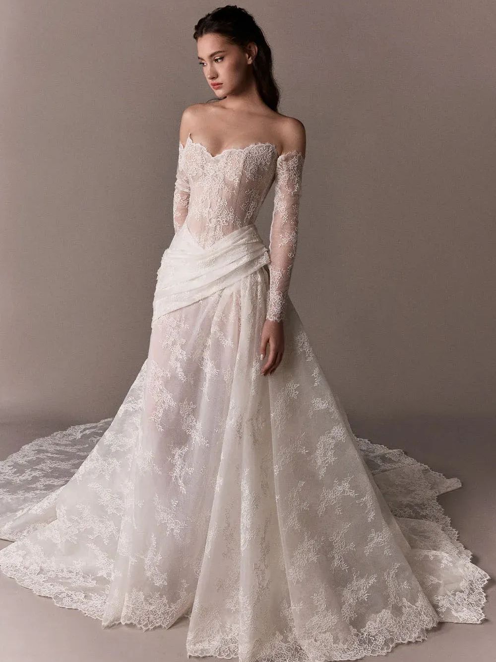 Plume by Kristie Justine lace wedding gown with a draped waist panel, shown from the front, back and in detail in a New York Bridal Fashion Week trend roundup.