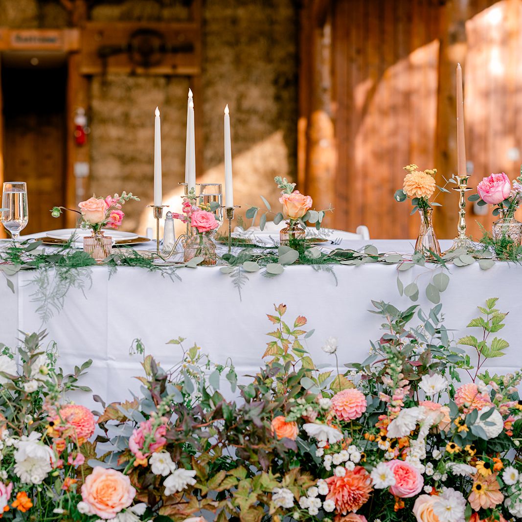 Intricate Tablescape Featuring Peachy Florals in Haley and Matthews Wedding at Mountain Springs Lodge