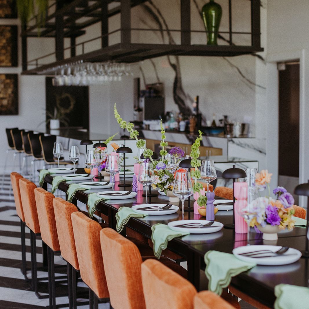 Modern and funky imagined reception scene featuring pastel hues at District Wine Bar