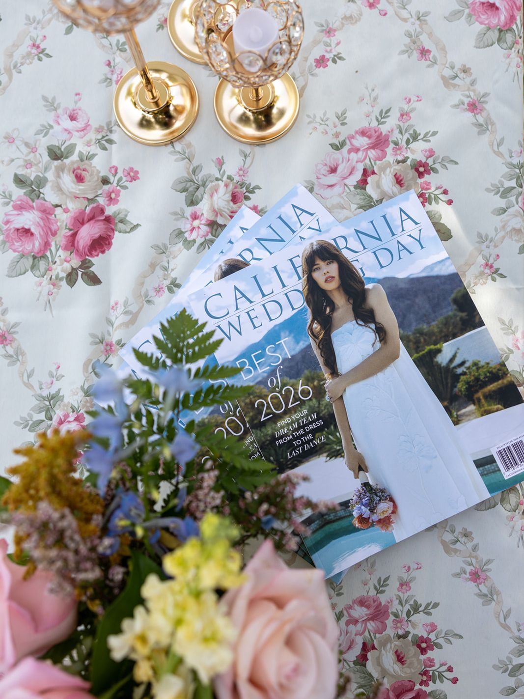 California Wedding Day magazine displayed among flowers at the ILEA Napa-Sonoma event