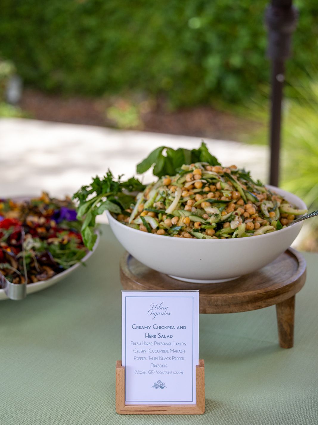 Catered salad and event menu displayed at the ILEA Napa-Sonoma gathering