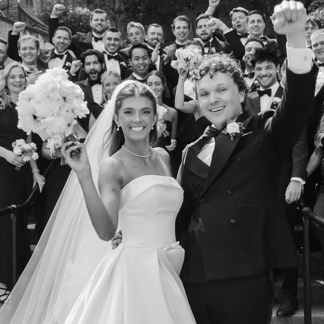newlyweds with guests