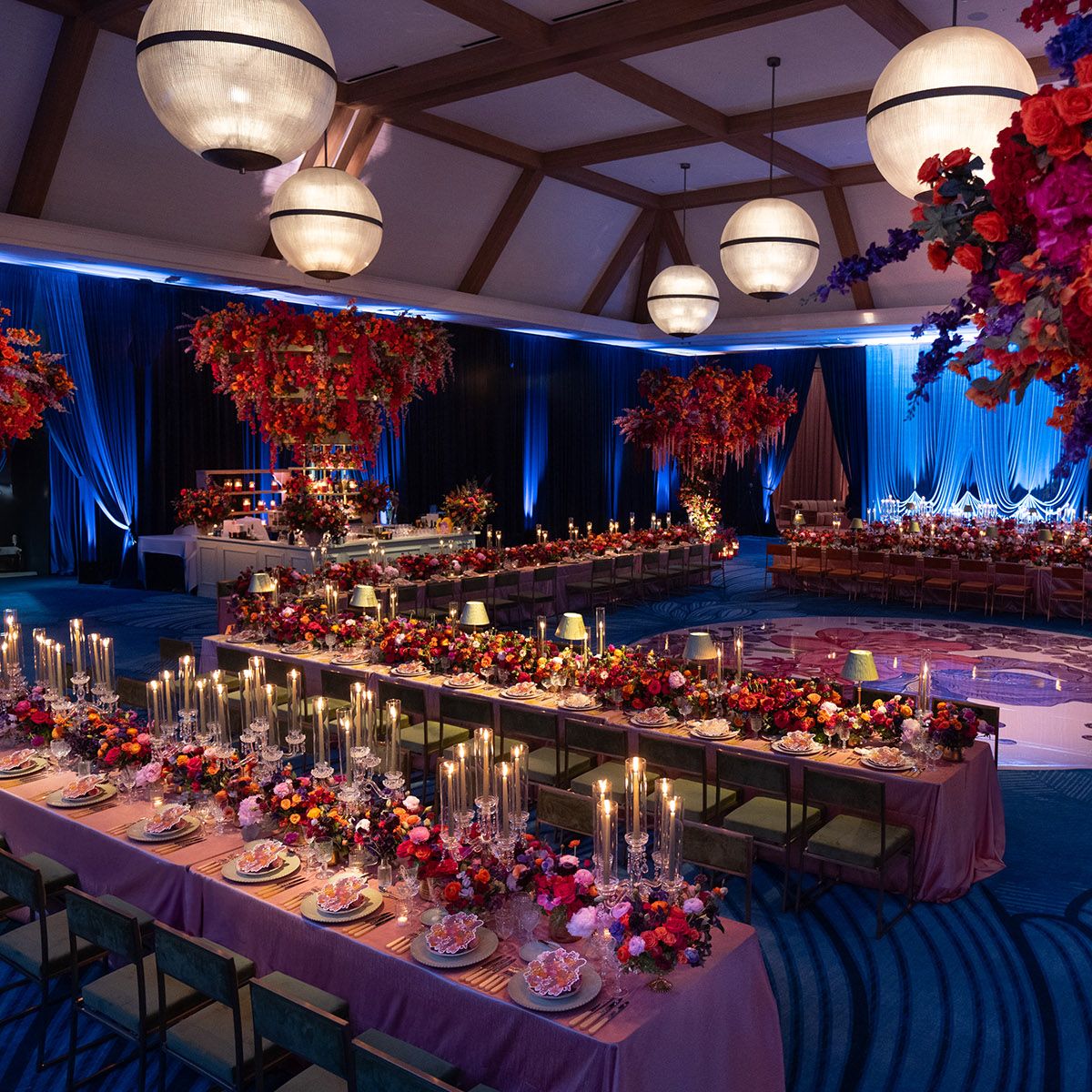 Award-winning jewel-toned reception scene at Hotel del Coronado