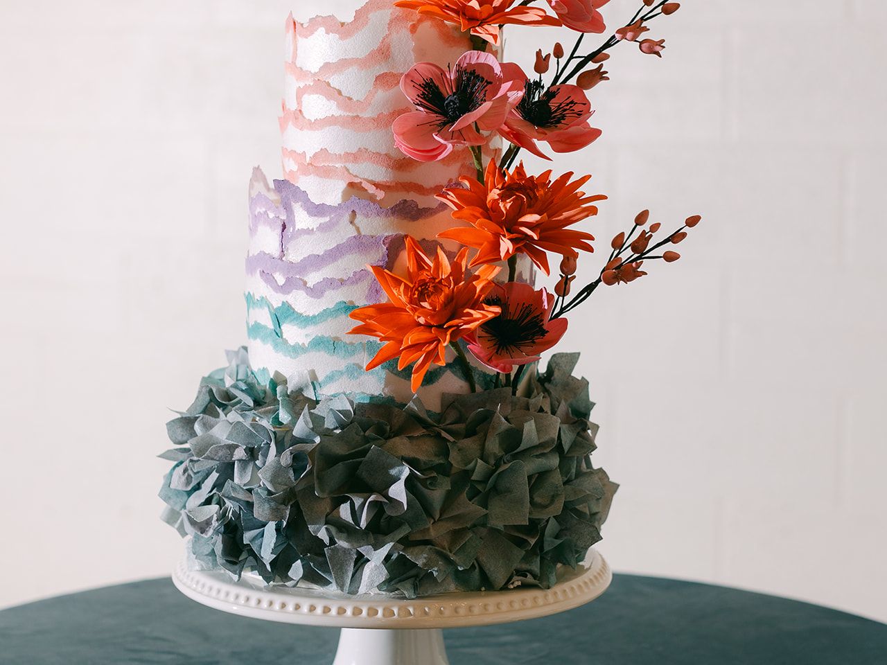 2025-07/colorful-ruffled-tiered-wedding-cake-with sugar-flowers.jpg