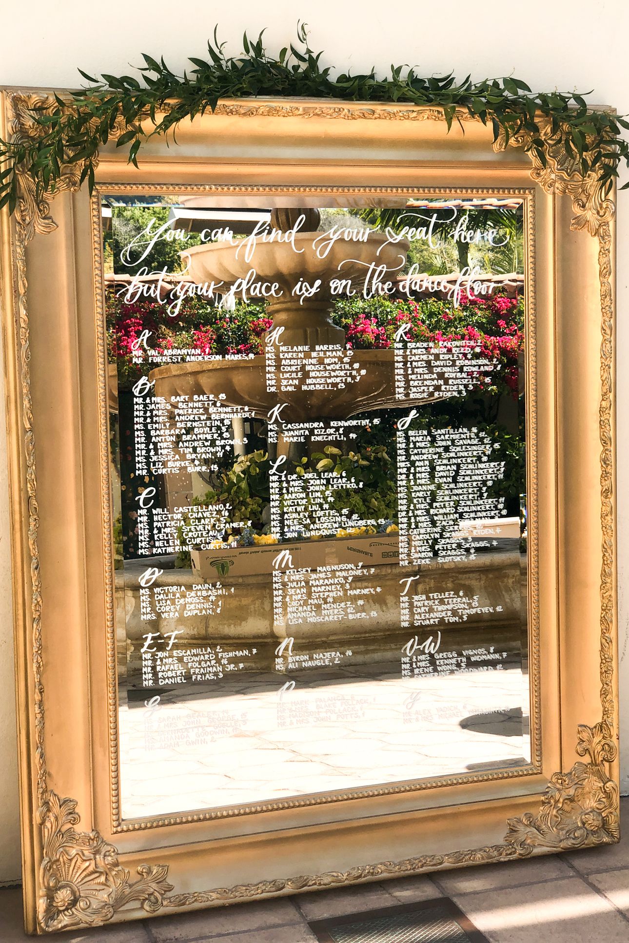 2024-04/Floor-length large golden vintage mirror seating chart for wedding in los angeles.jpg
