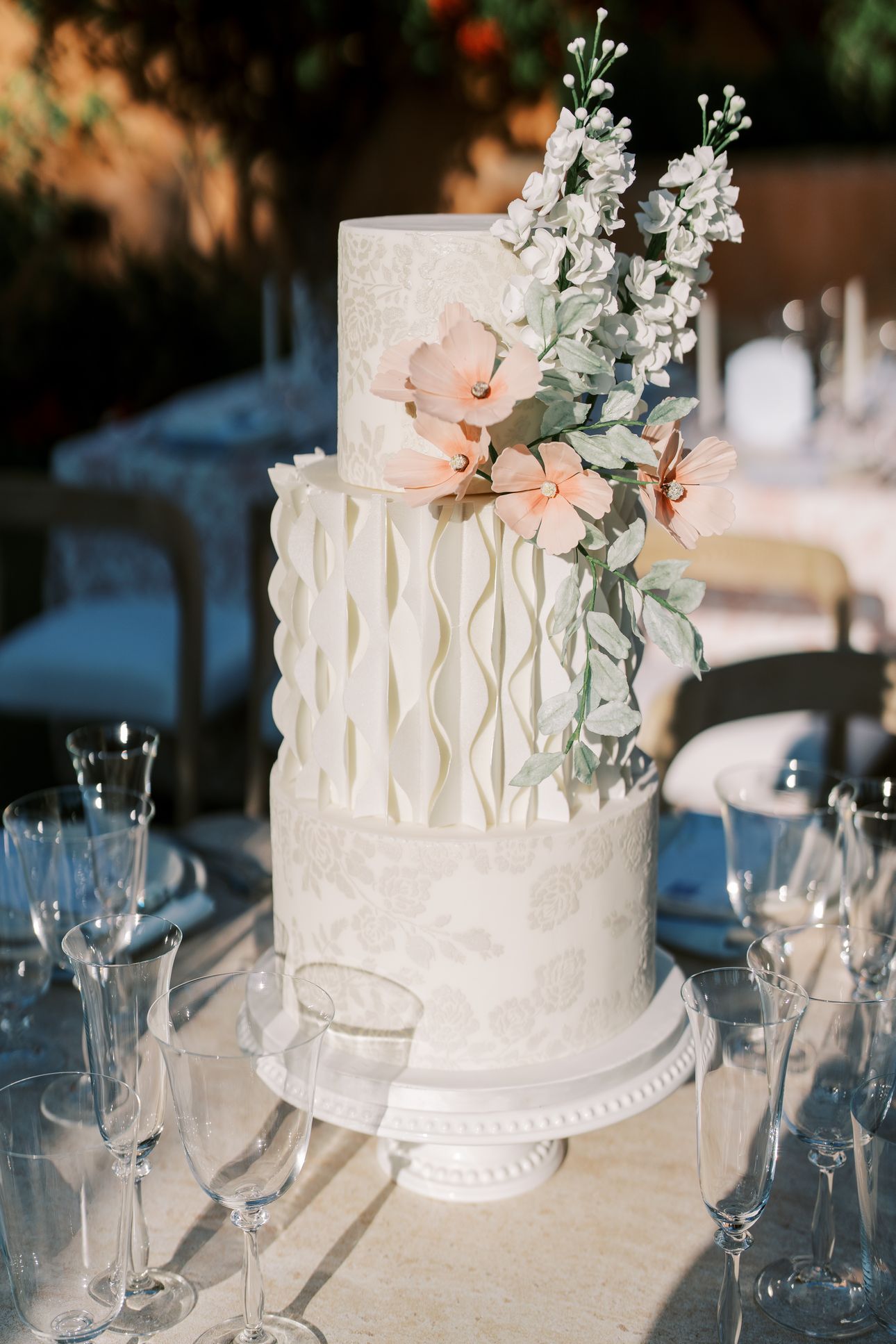 2025-07/modern-texture-wedding-cake-with-sugar-flowers.jpg