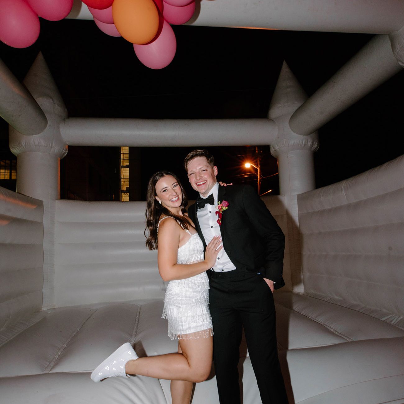 Alicia and Shane enjoying their bounce house on wedding night.