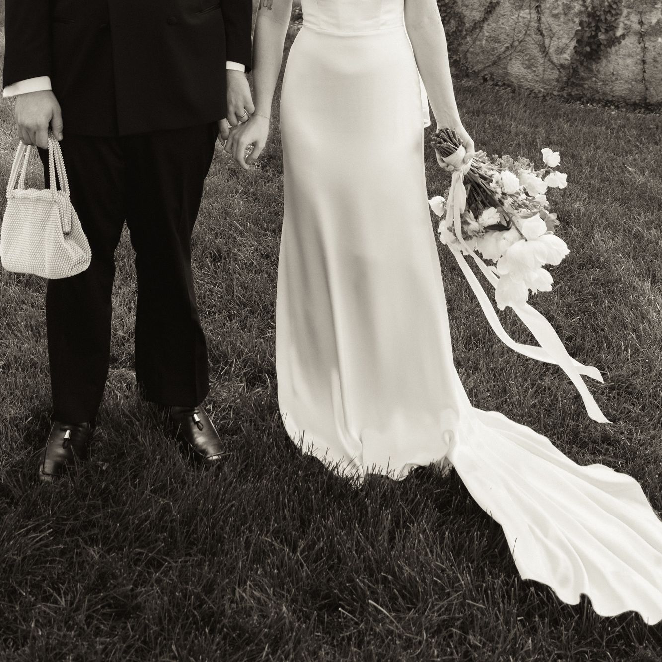 Bottom half of Addie and Walker's wedding day ensembles, in black and white