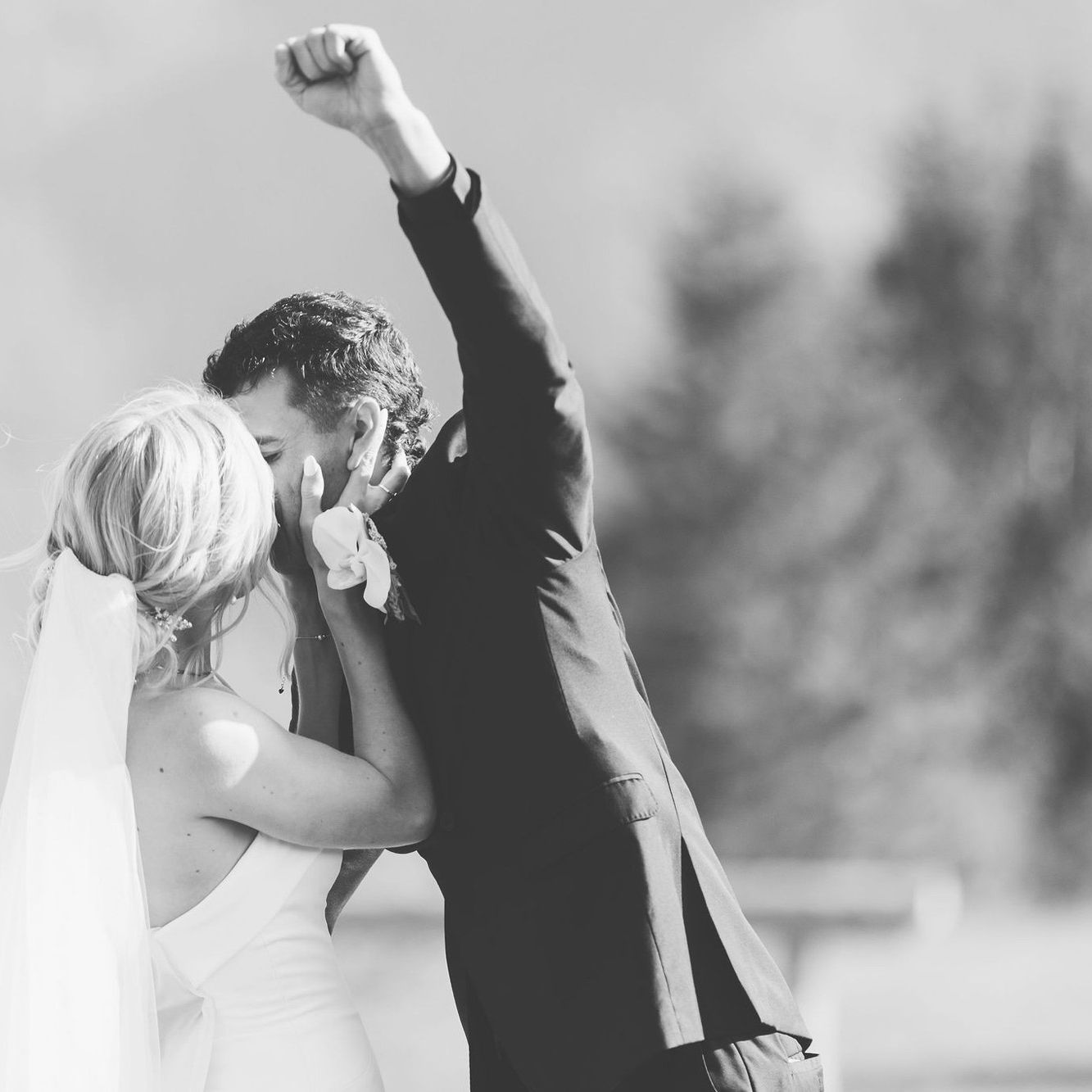 Ashley and Jaxson seal their vows with a kiss and Jaxson pumps his fist in the air 