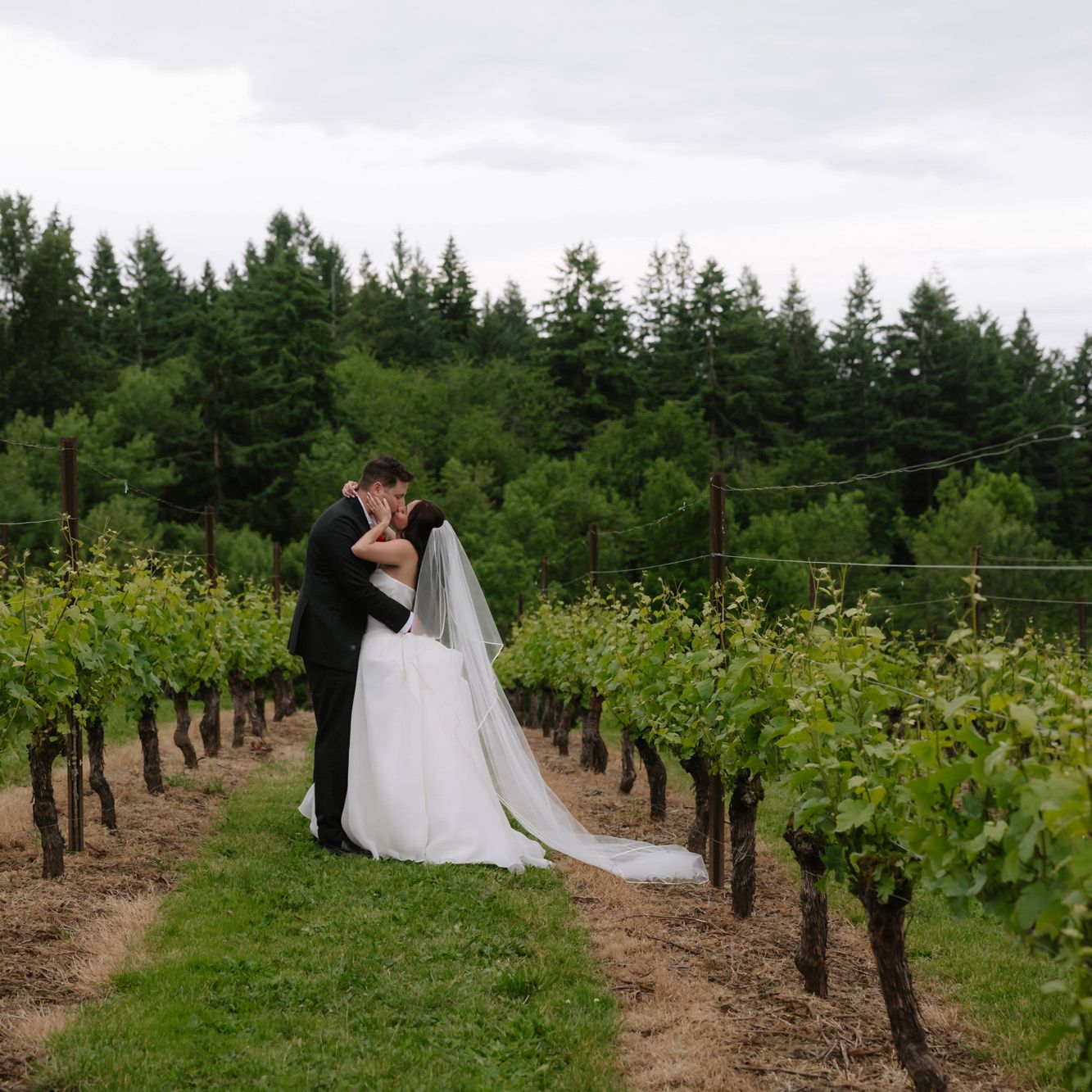 Amanda and Sam pose on the grounds of Oswego Hills Winery