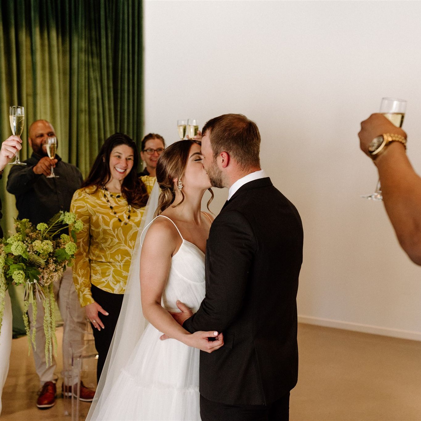 newlyweds kissing