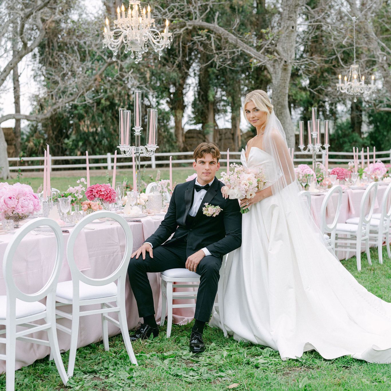 Model bride and groom in classic, chic wedding attire with blush, elegant reception table at Walnut Grove styled shoot