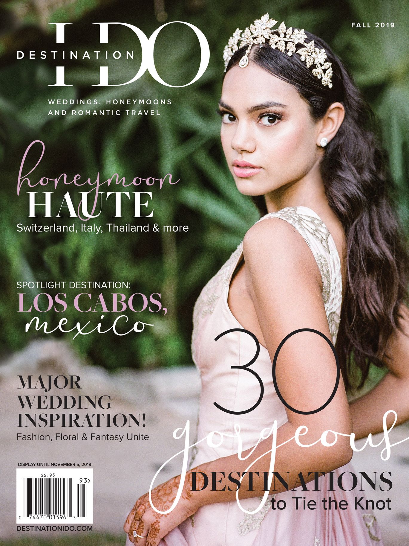 Destination I Do Fall 2019 magazine cover featuring a bride wearing an ornate floral headpiece and blush wedding gown against a leafy backdrop.