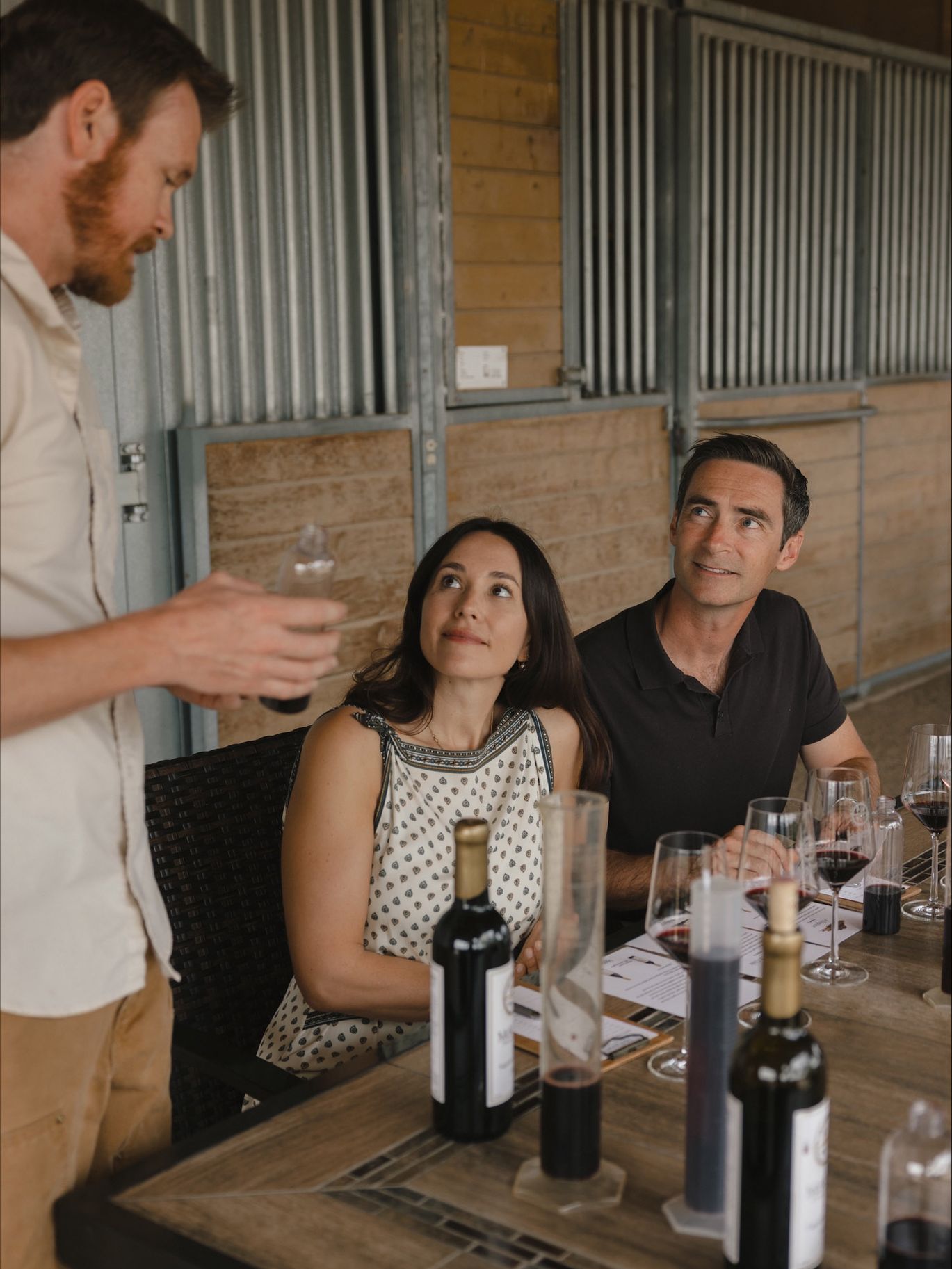 A wine expert guides guests through a red wine tasting and blending session as part of The Ritz-Carlton Bacara, Santa Barbara’s Winemaker for a Day experience