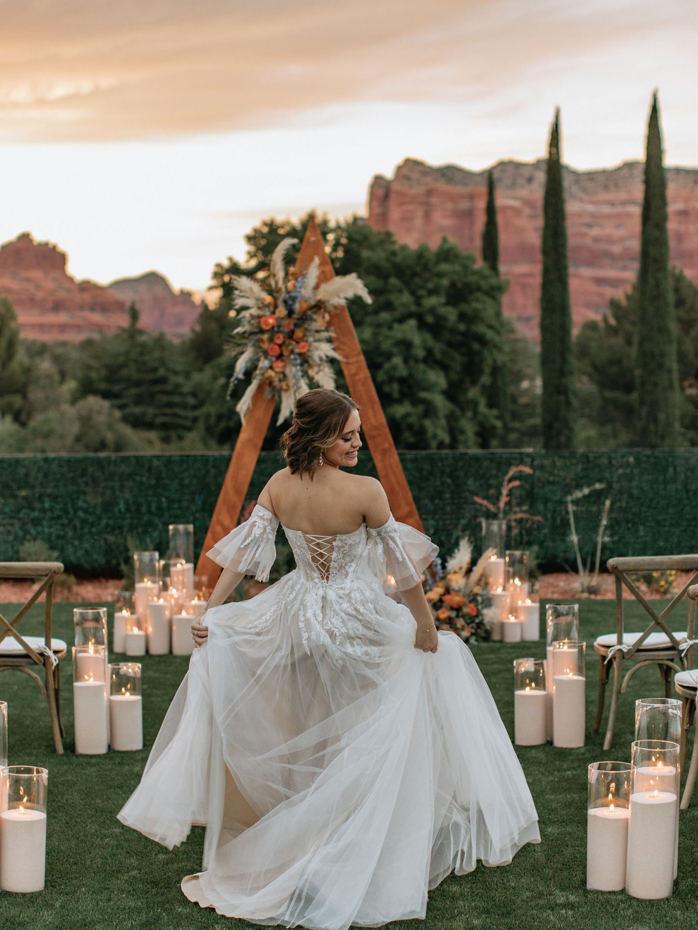 SDXSE Wedding Sanctuary at Bell Rock in Arizona bride twirling in aisle