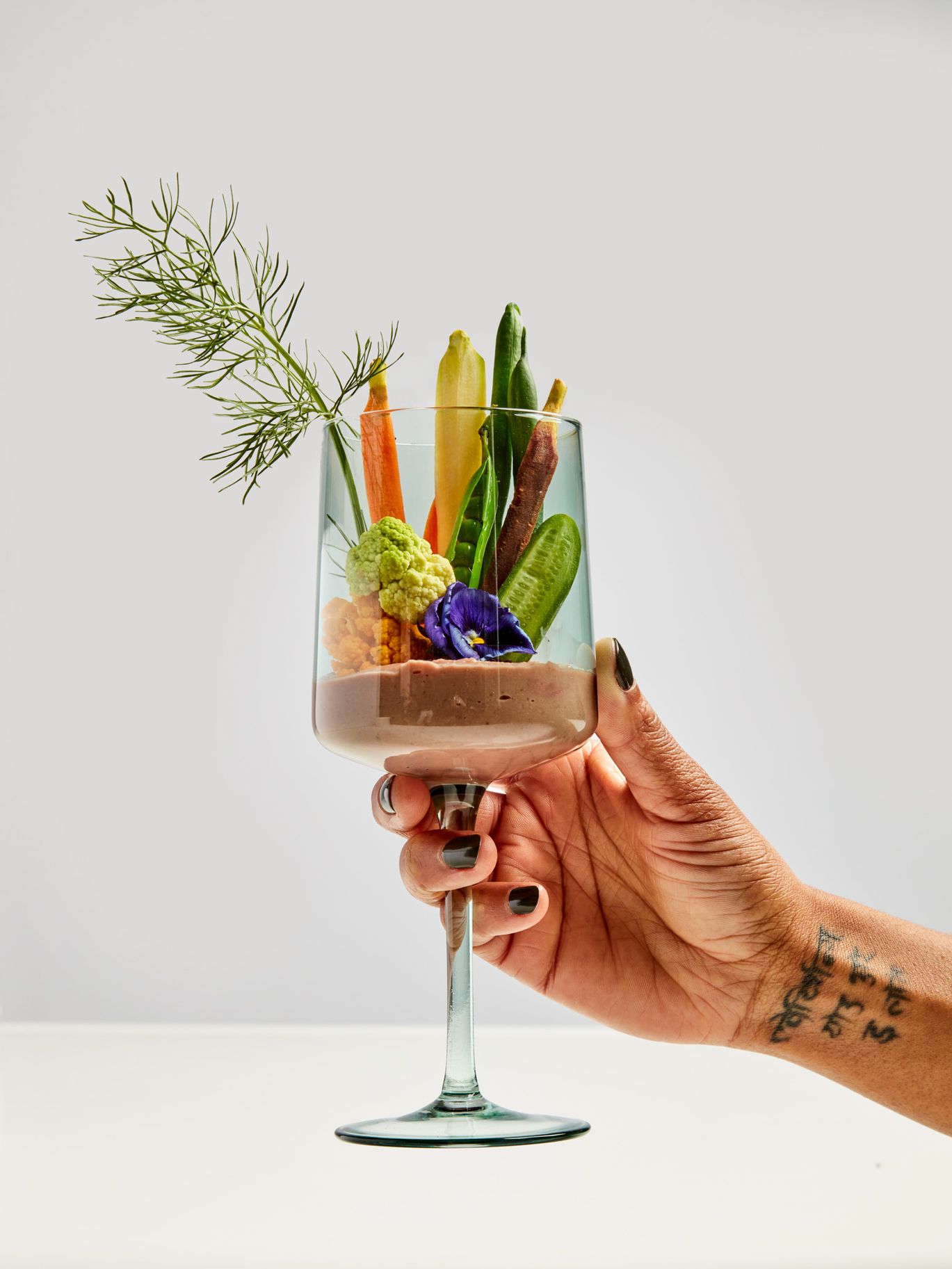 2023-11/Final Hand with Glass.jpg