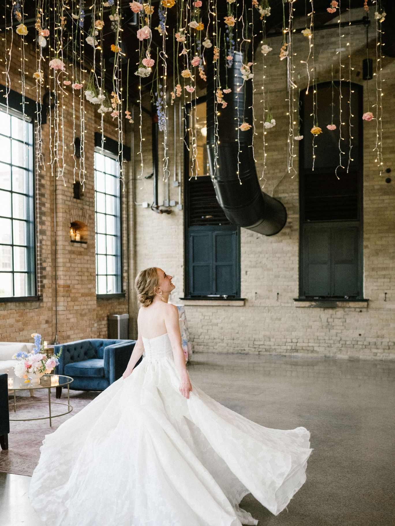 2026-06/Essence Center (Capiz chandelier and bride twirling) - Kellie Rae Studio .jpg