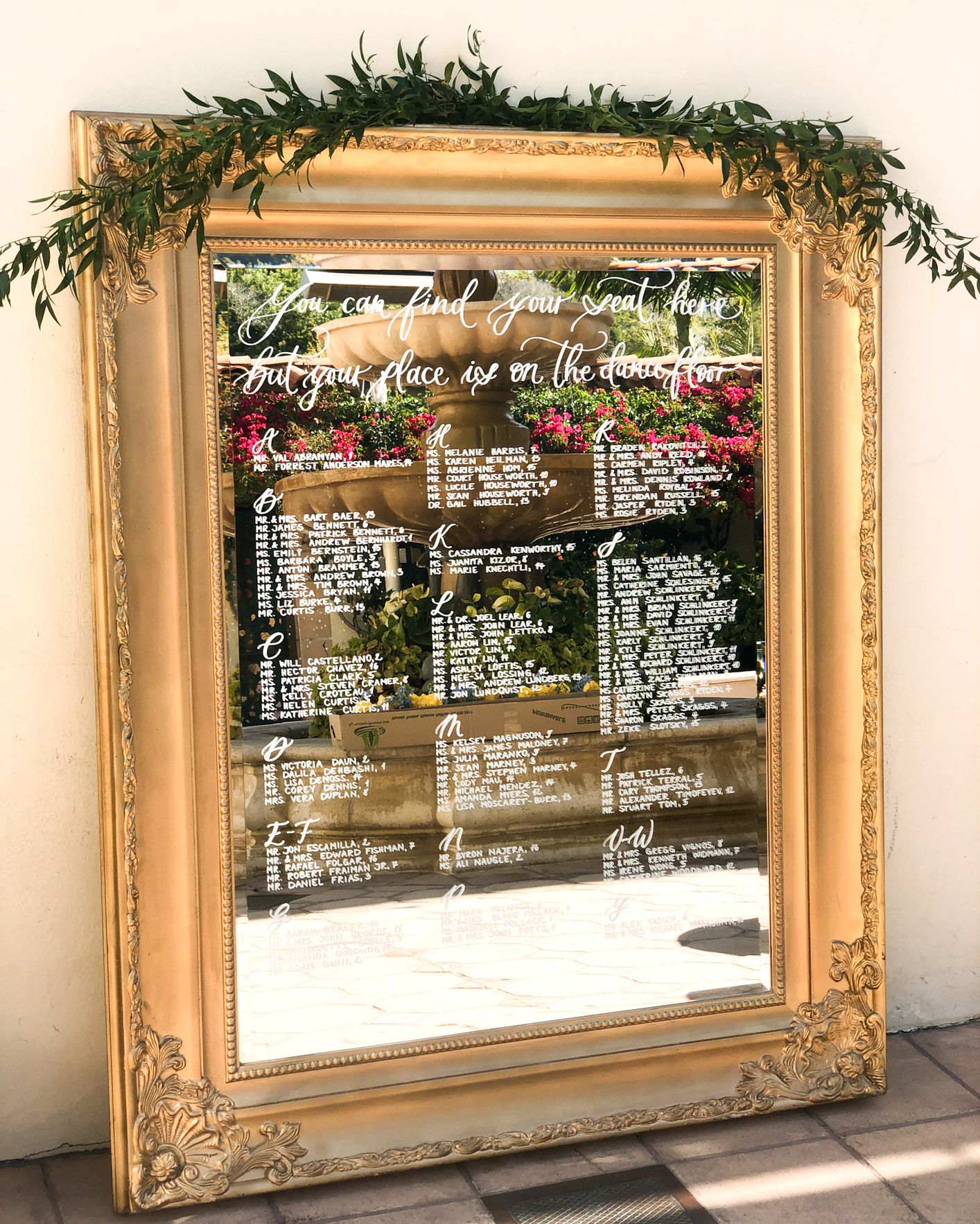 2024-04/Floor-length large golden vintage mirror seating chart for wedding in los angeles.jpg