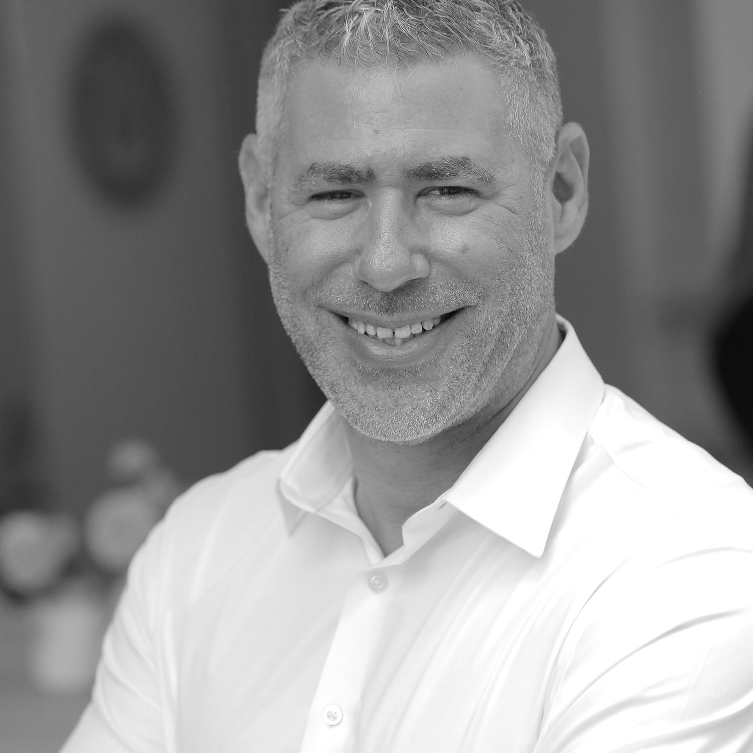 Professional black-and-white headshot of Brian Franklin, founder of Vows & Speeches, expert wedding speechwriter and vow coach based in California