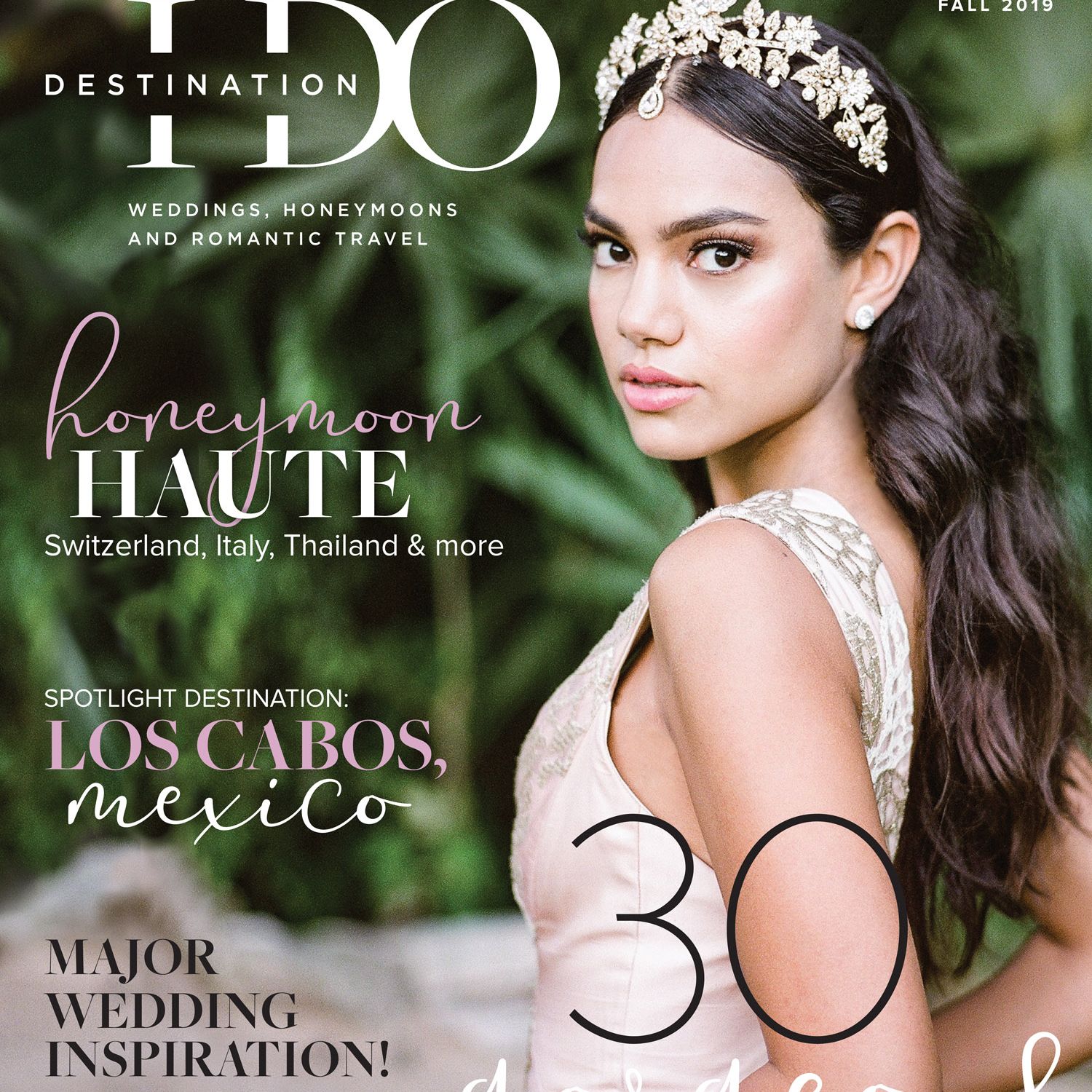 Destination I Do Fall 2019 magazine cover featuring a bride wearing an ornate floral headpiece and blush wedding gown against a leafy backdrop.