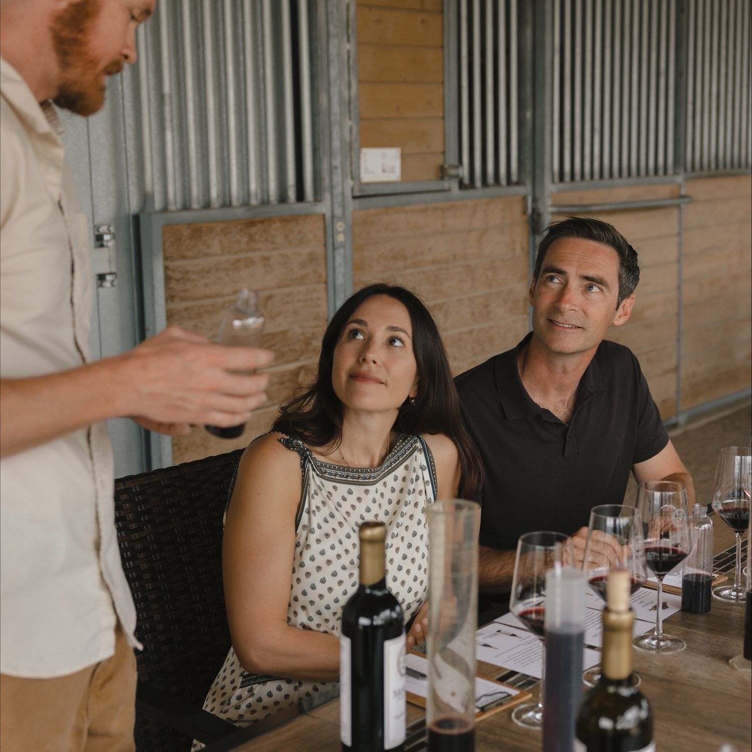 A wine expert guides guests through a red wine tasting and blending session as part of The Ritz-Carlton Bacara, Santa Barbara’s Winemaker for a Day experience