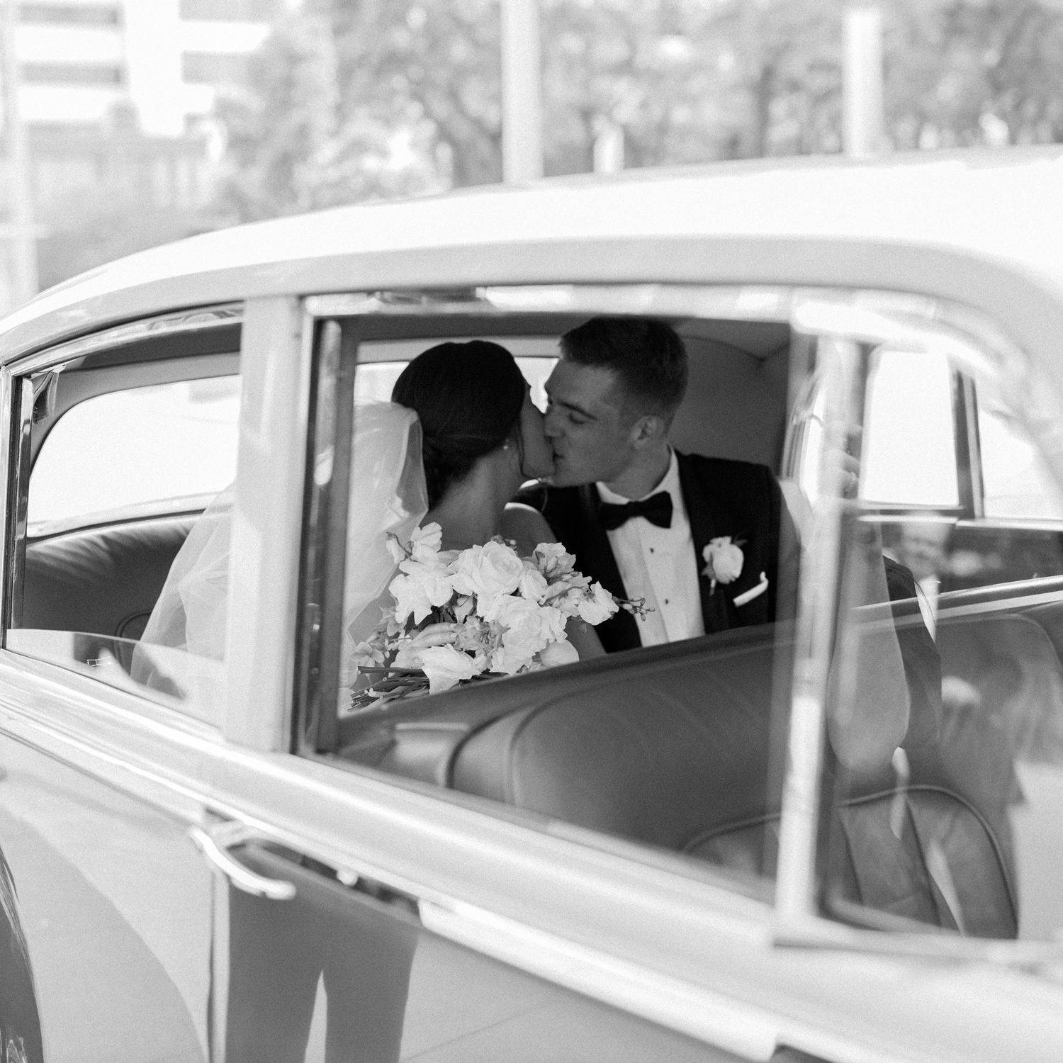 Meredith and Daniel ride off in their getaway car on their wedding day 