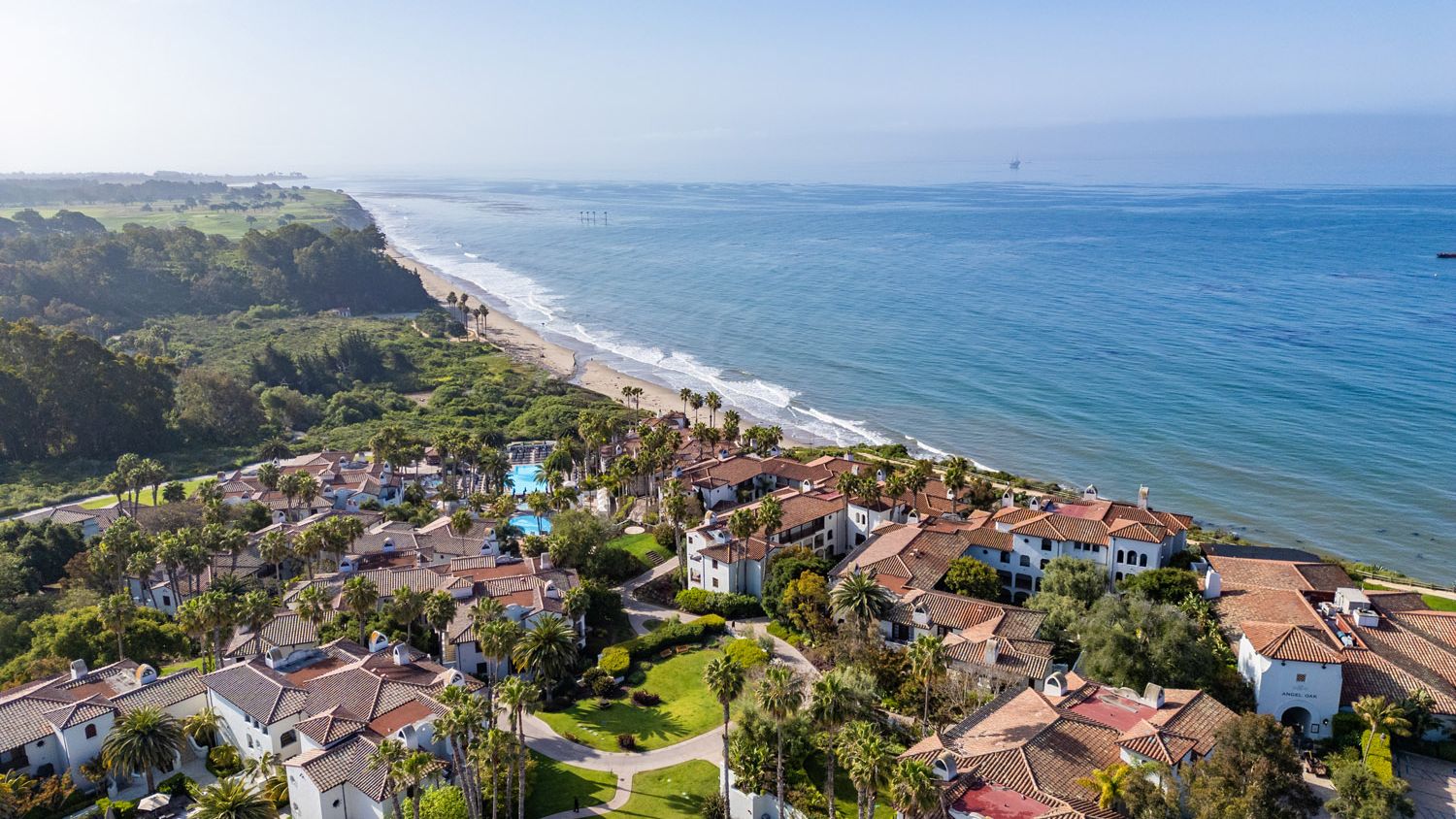 An aerial view of The Ritz-Carlton Bacara, Santa Barbara showcases the resort’s Spanish-style architecture, pools and gardens along the Pacific coastline