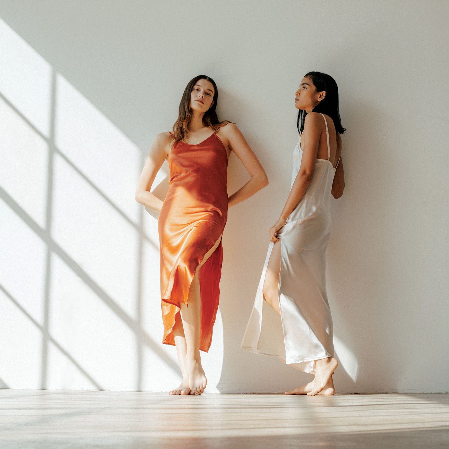Two Models Pose in The Ruby Dress by Vincente