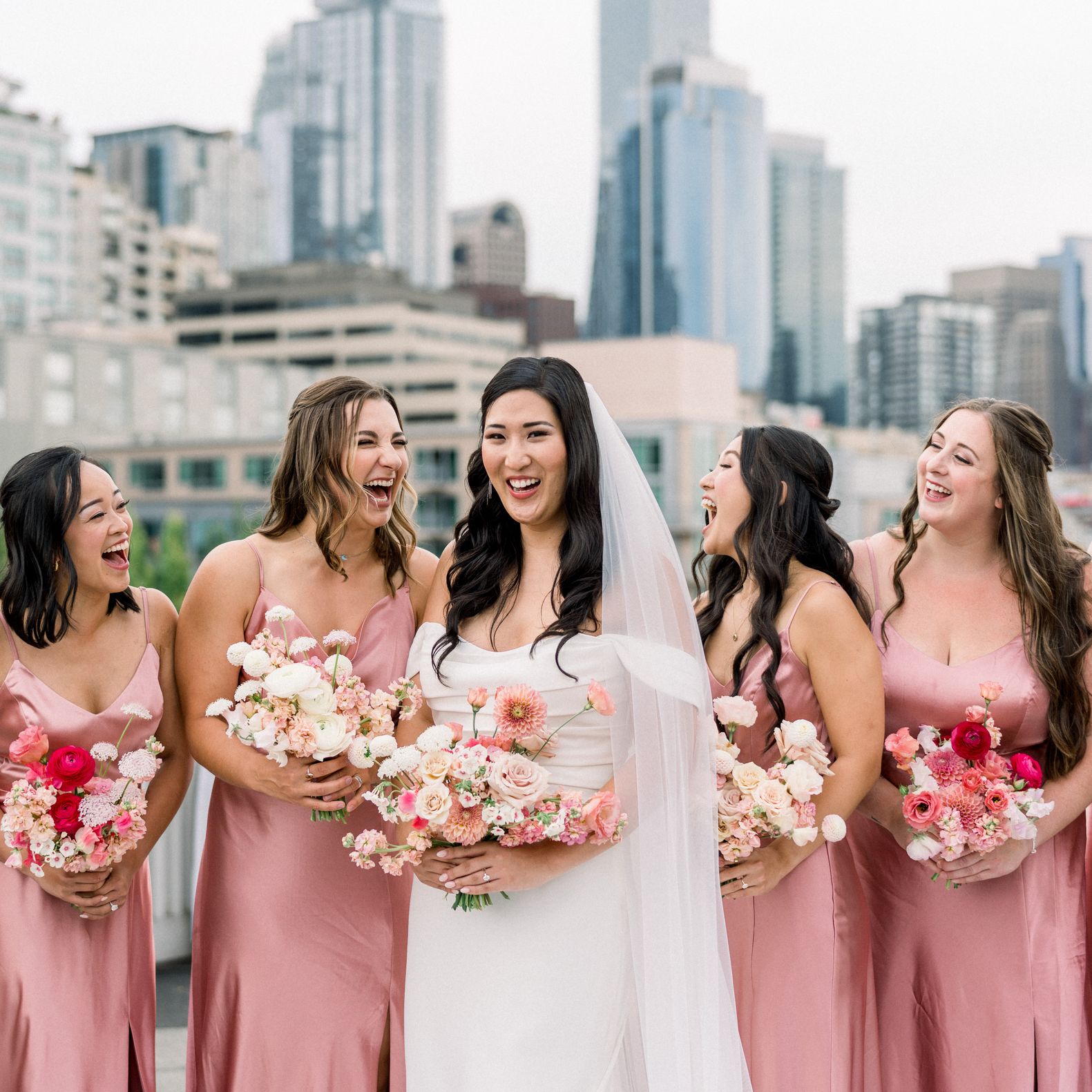 Brilliana and her Bridesmaids are All Smiles in front of the Seattle Skyline