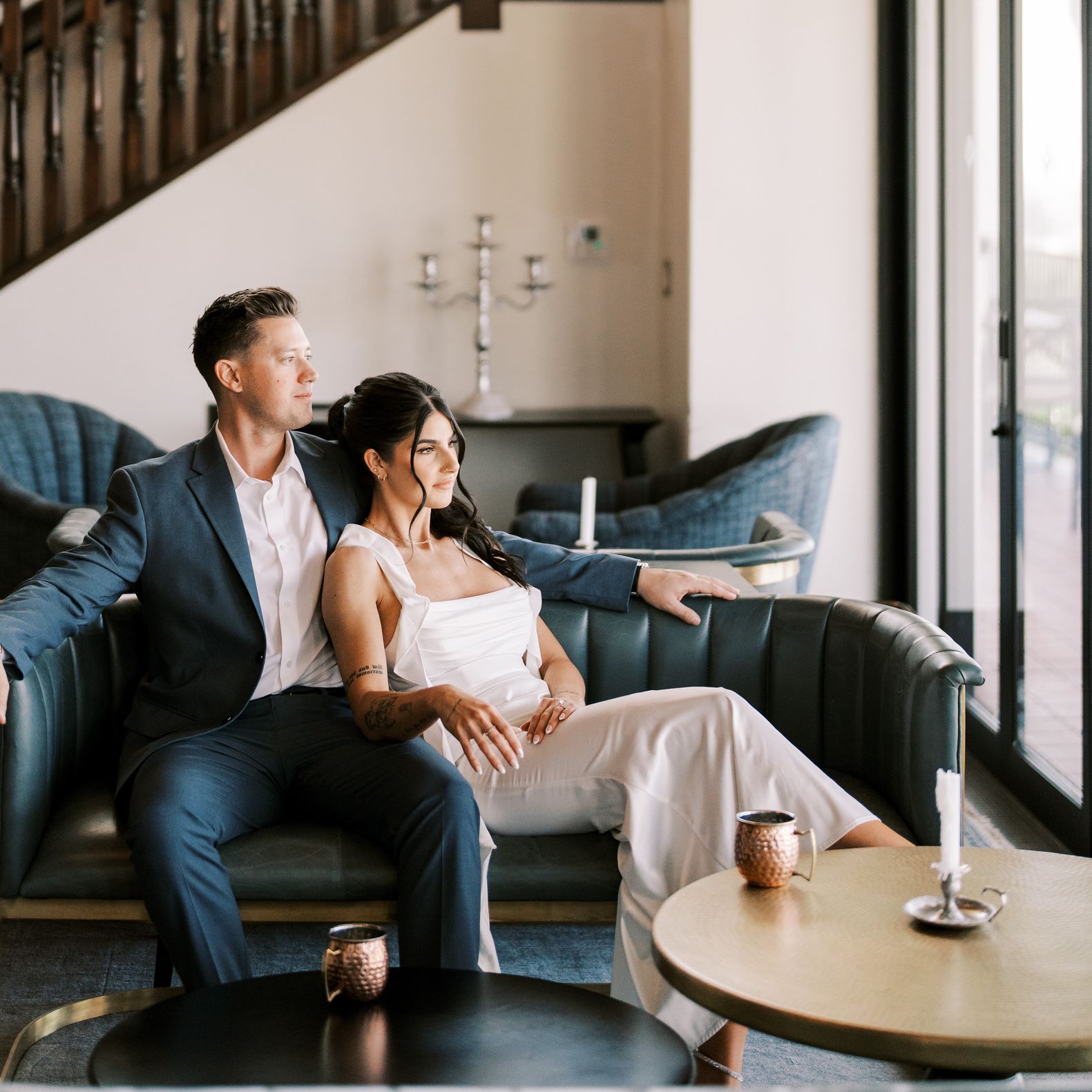 Moody-chic engagement session with a blue and orange color scheme at Wrigley Mansion