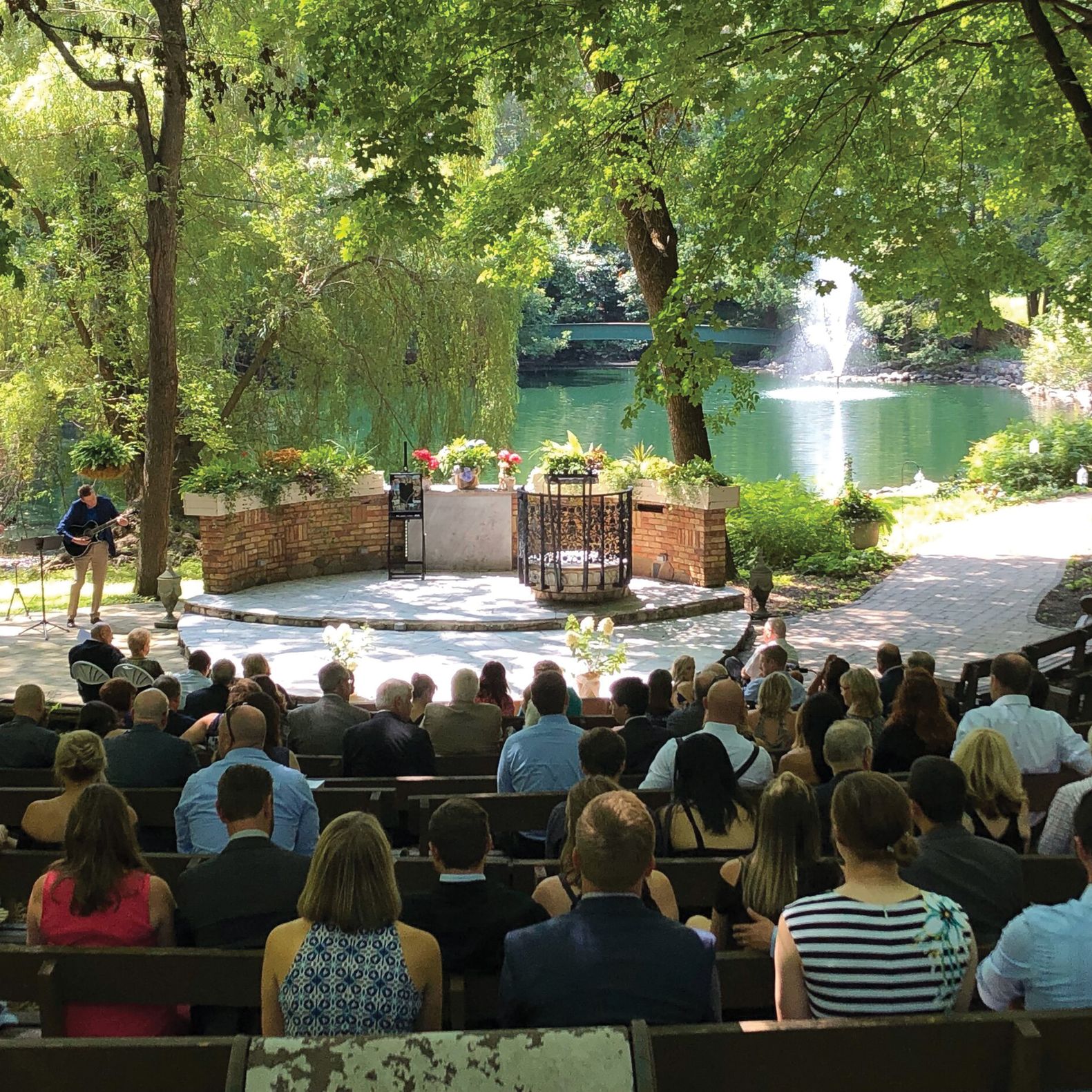 2025-04/pond w people.jpg