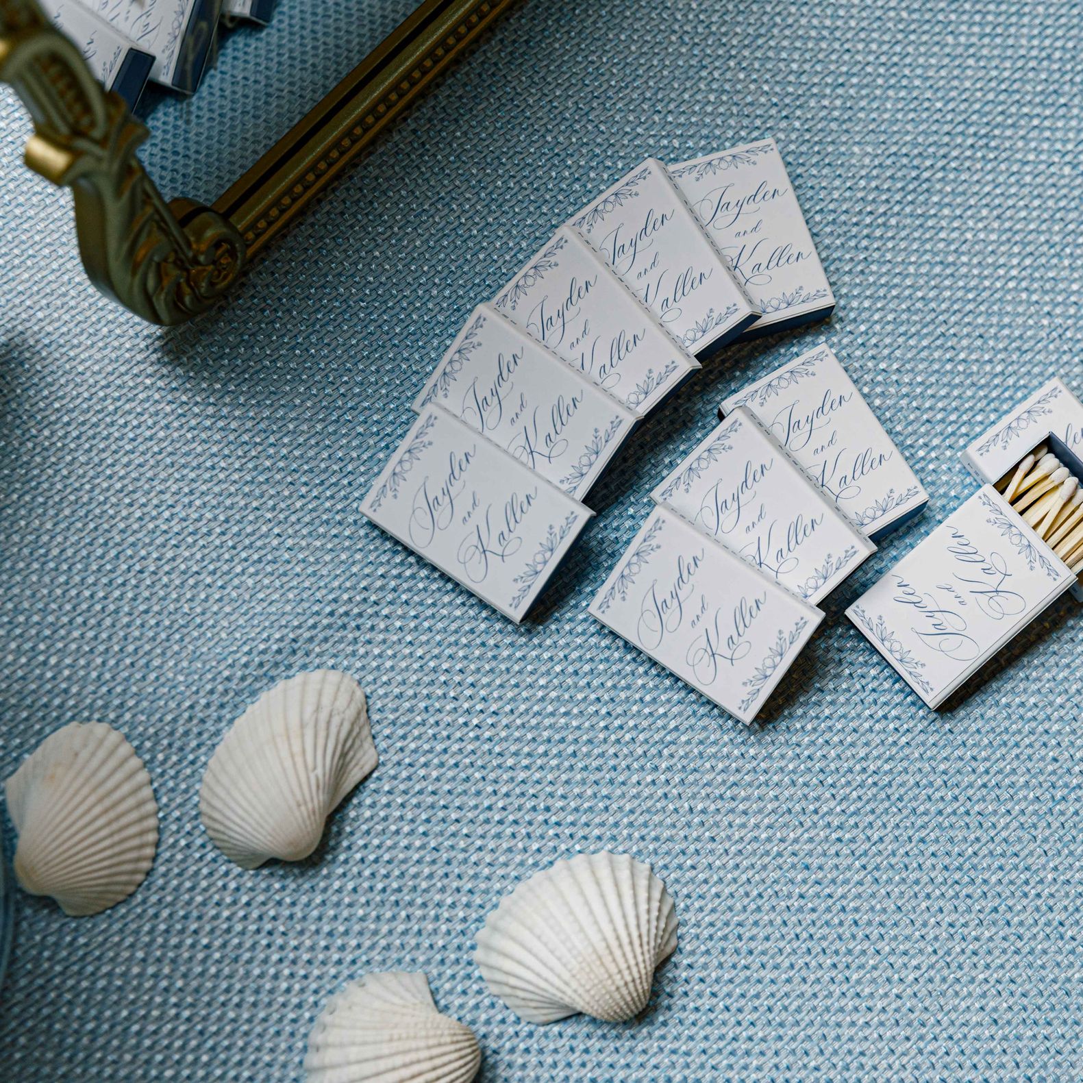 Custom matchbooks on blue tablecloth