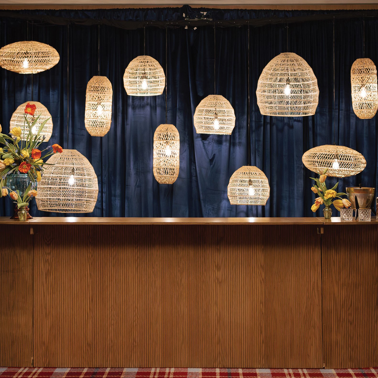 Retro-chic bar layout with modern lighting in editorial at Graduate