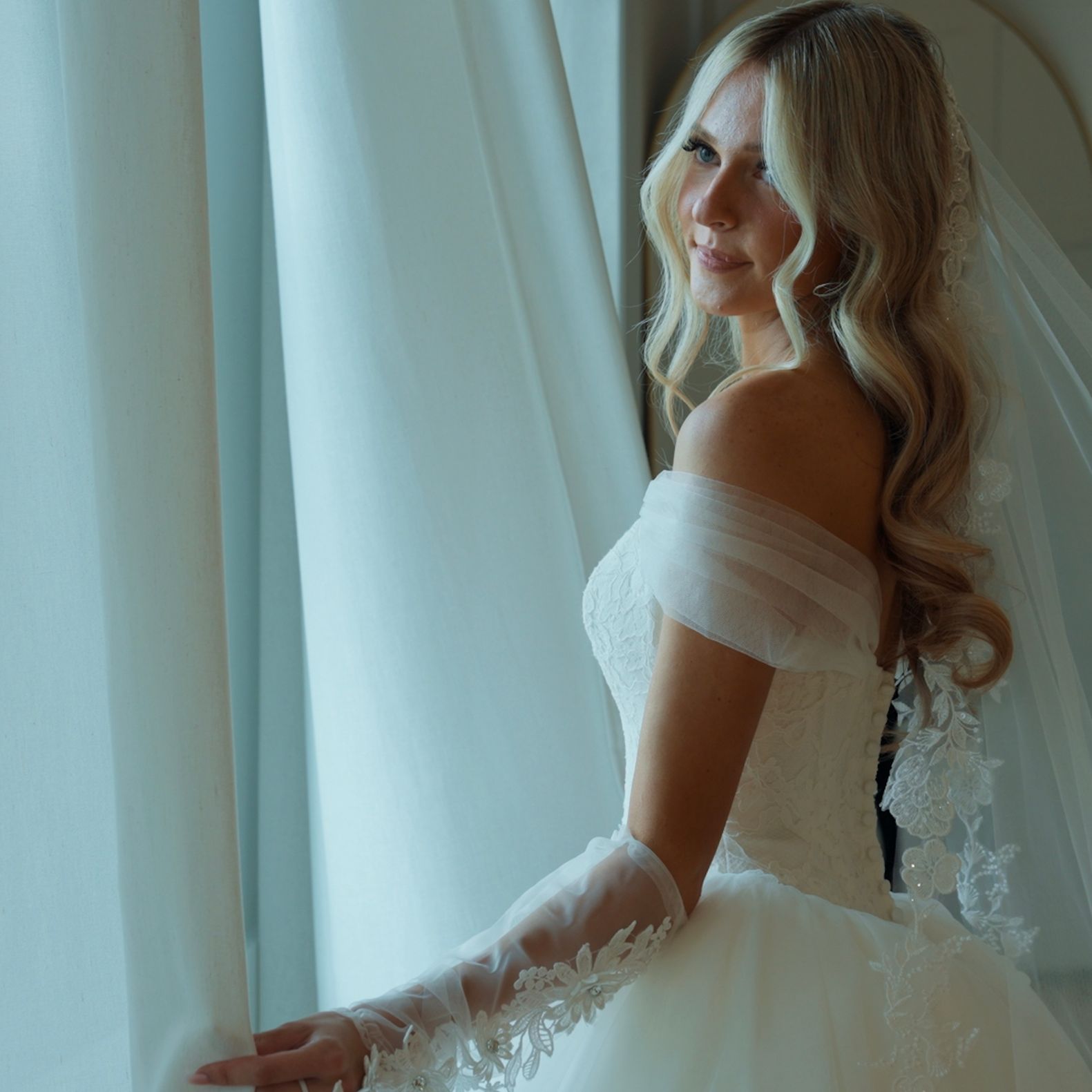 2026-08/bride in window.jpg