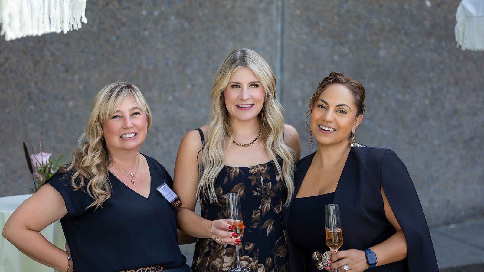Three wedding industry professionals gather at the ILEA Napa-Sonoma event at Rodney Strong Vineyards