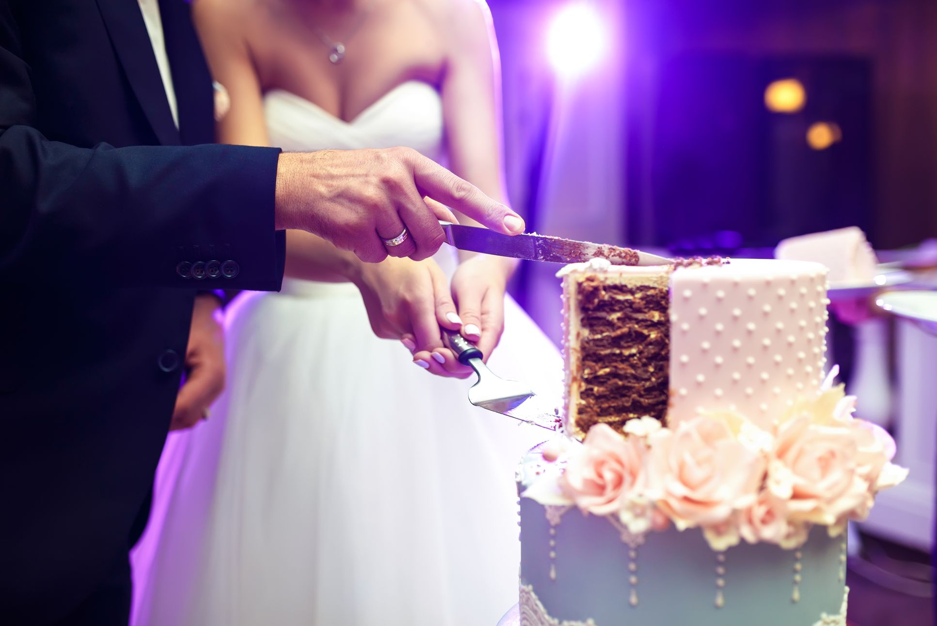 2024-12/Bride and Groom cutting Cake.jpg