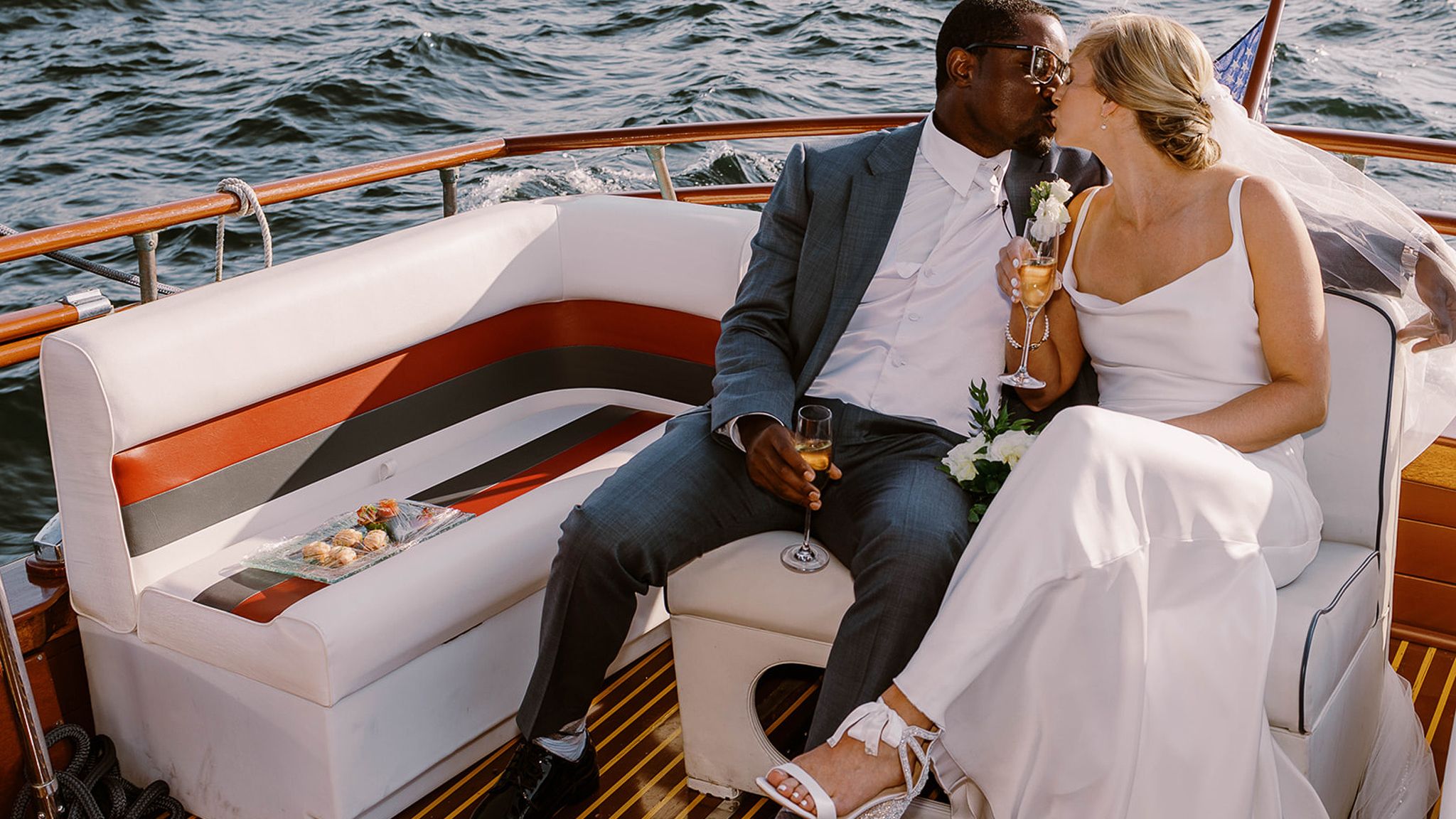 2024-03/woodmark-hotel-weddings-katy-and-gio-summer-2023-boatride-011.jpg