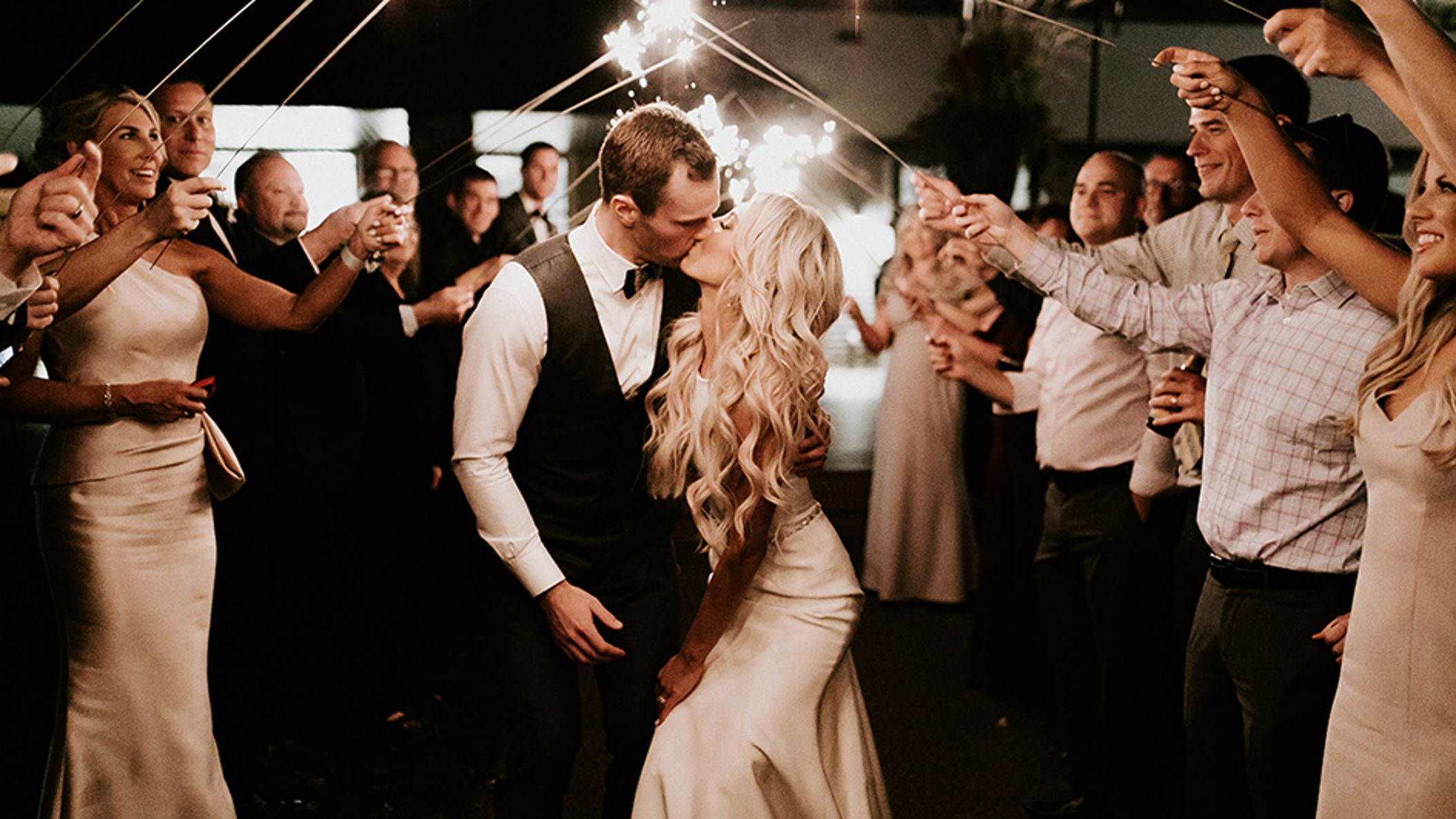 Minnesota_Bride/2021/Casteele_Charlie/casteelecharliewedding2019dancesparkler23of67.jpg