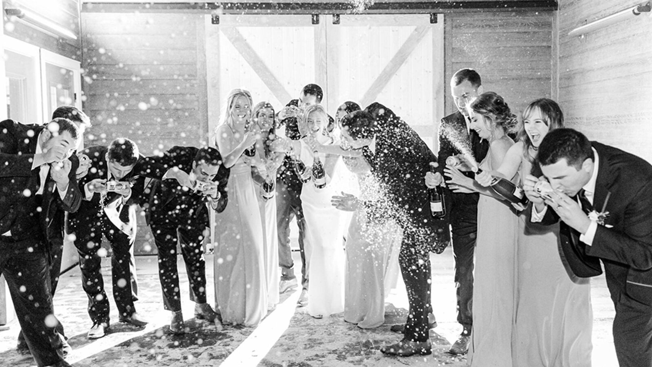 inline-images/36_nye_wedding_at_barnwood_events_madison_wisconsin_champagne_pop.jpg