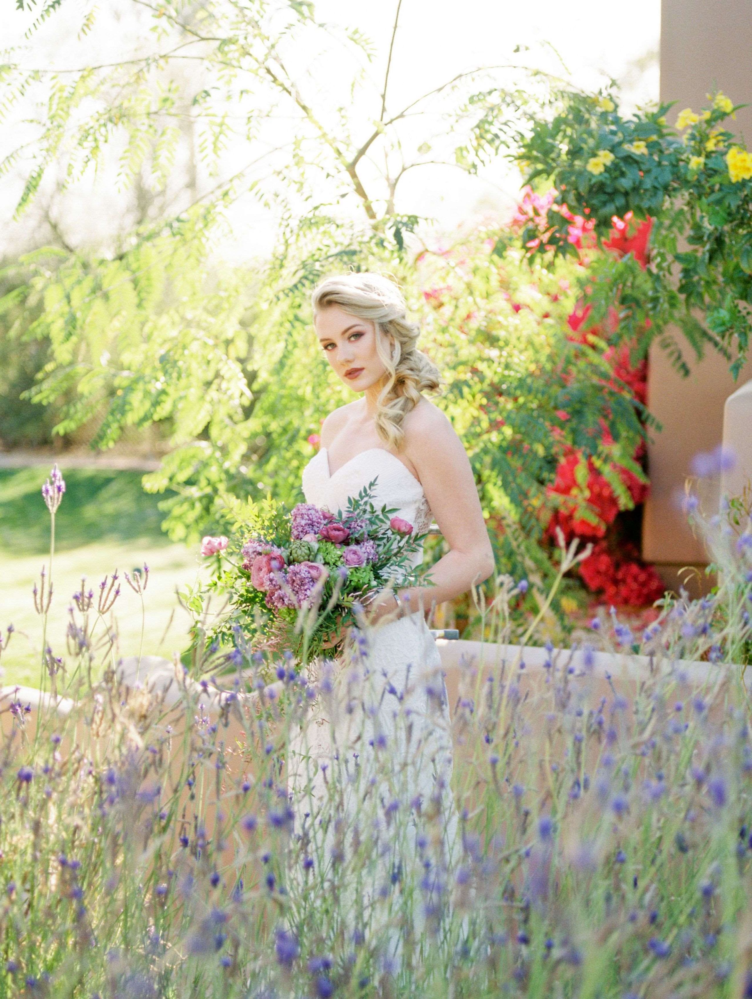 2023-12/Bride with bouquet in gardens.jpg