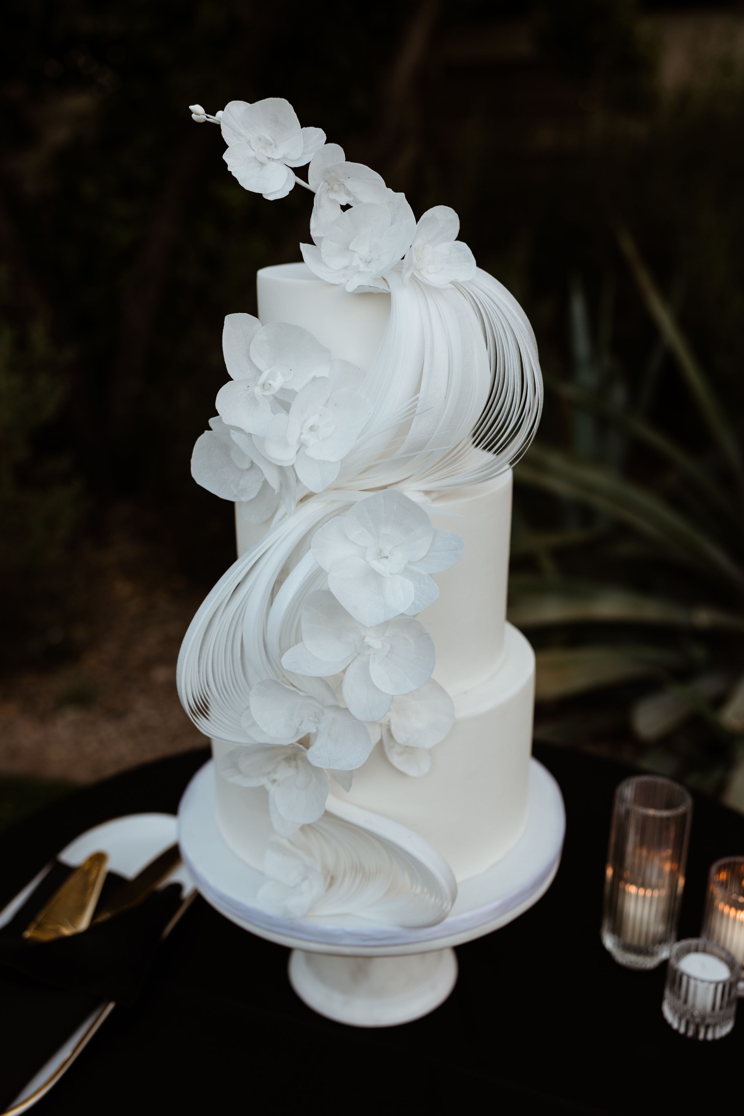 2025-07/modern-white-orchid-tiered-cake.jpg