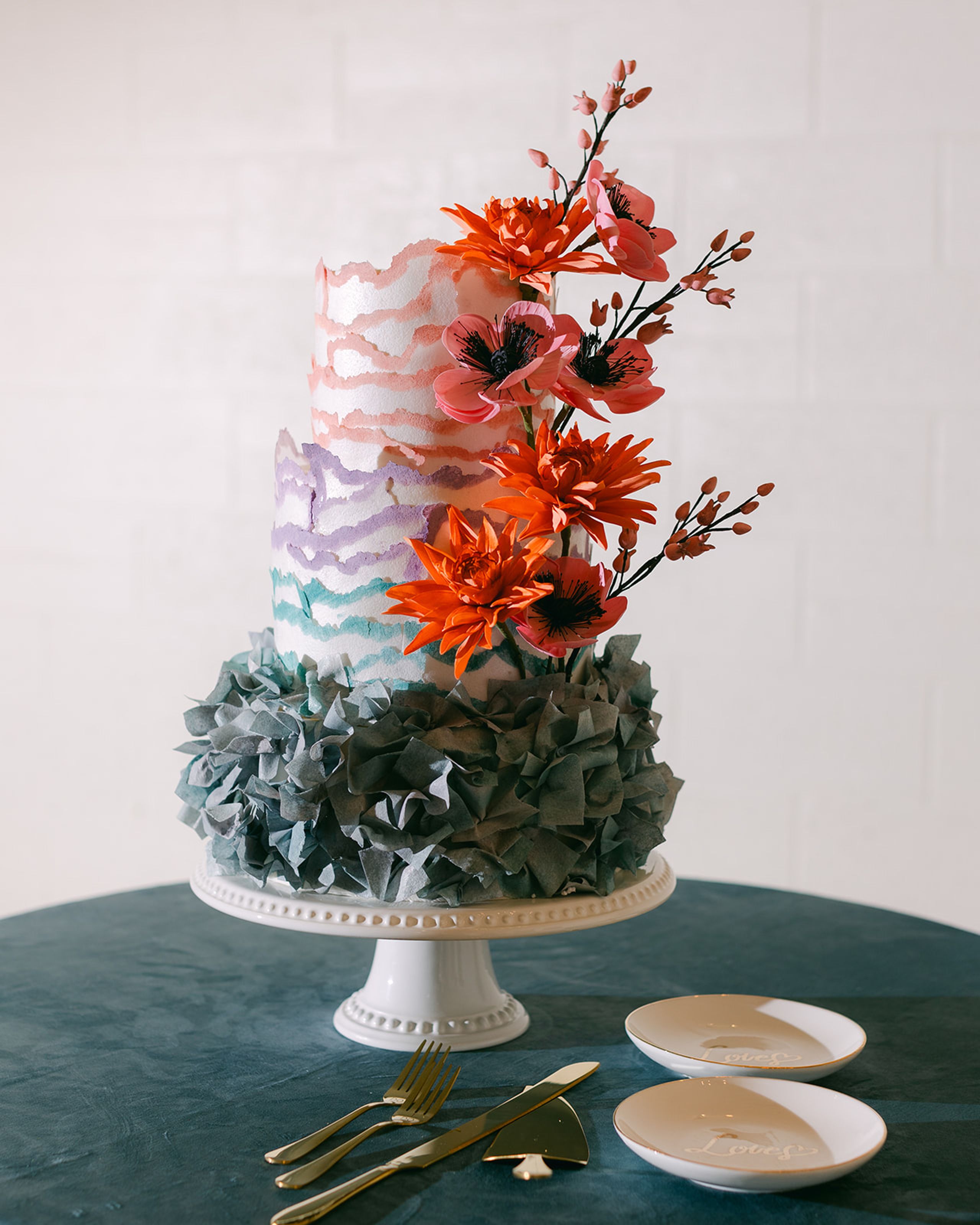 2025-07/colorful-ruffled-tiered-wedding-cake-with sugar-flowers.jpg