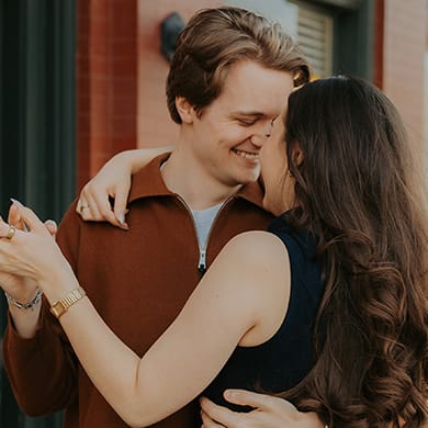 Olivia and Erik share a tender moment dancing during their engagement session with Caitlin & Camera