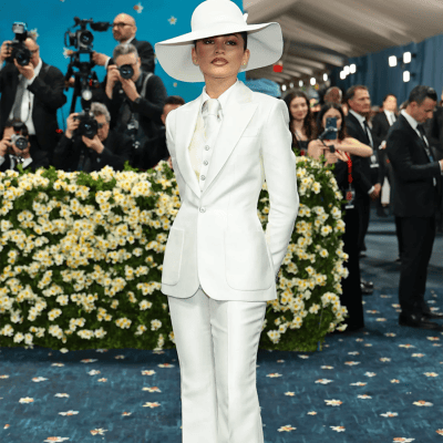 Zendaya wears a custom Louis Vuitton zoot suit, reimagining 1940s menswear with a contemporary twist, honoring the "Superfine: Tailoring Black Style" theme at the 2025 Met Gala.