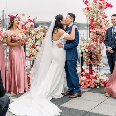 Brilliana and Michael Kiss at the Altar in Seattle Wedding