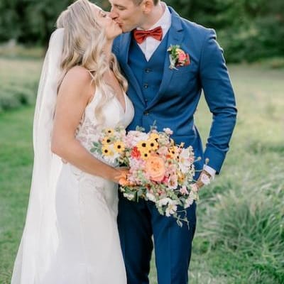 Haley and Matthew Share a Kiss on their Wedding Day at Mountain Springs Lodge