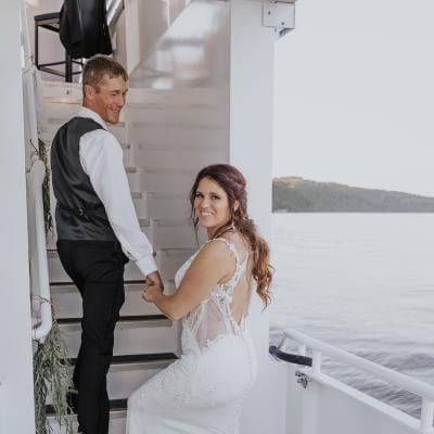 Happy Couple Smiles on the Gull Lake Cruises for their Wedding