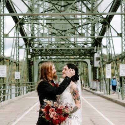 Brittany and Daryian Share an Intimate Moment Post-Wedding on the Stillwater Lift Bridge