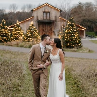 Madeline and Aaron Share a Kiss in front of Creekside Farm