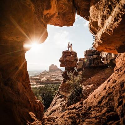 Raynie and Steven framed by Red Rock in Sedona Elopement